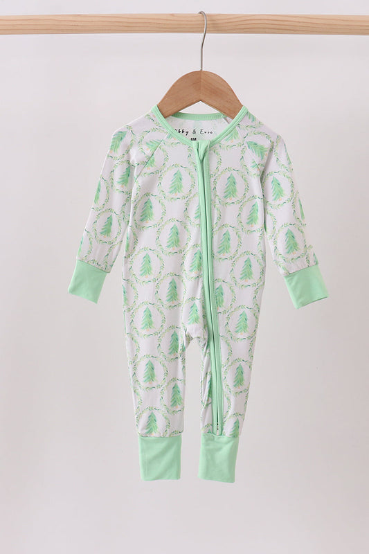 Green and white baby onesie with cactus pattern on a hanger against a white background