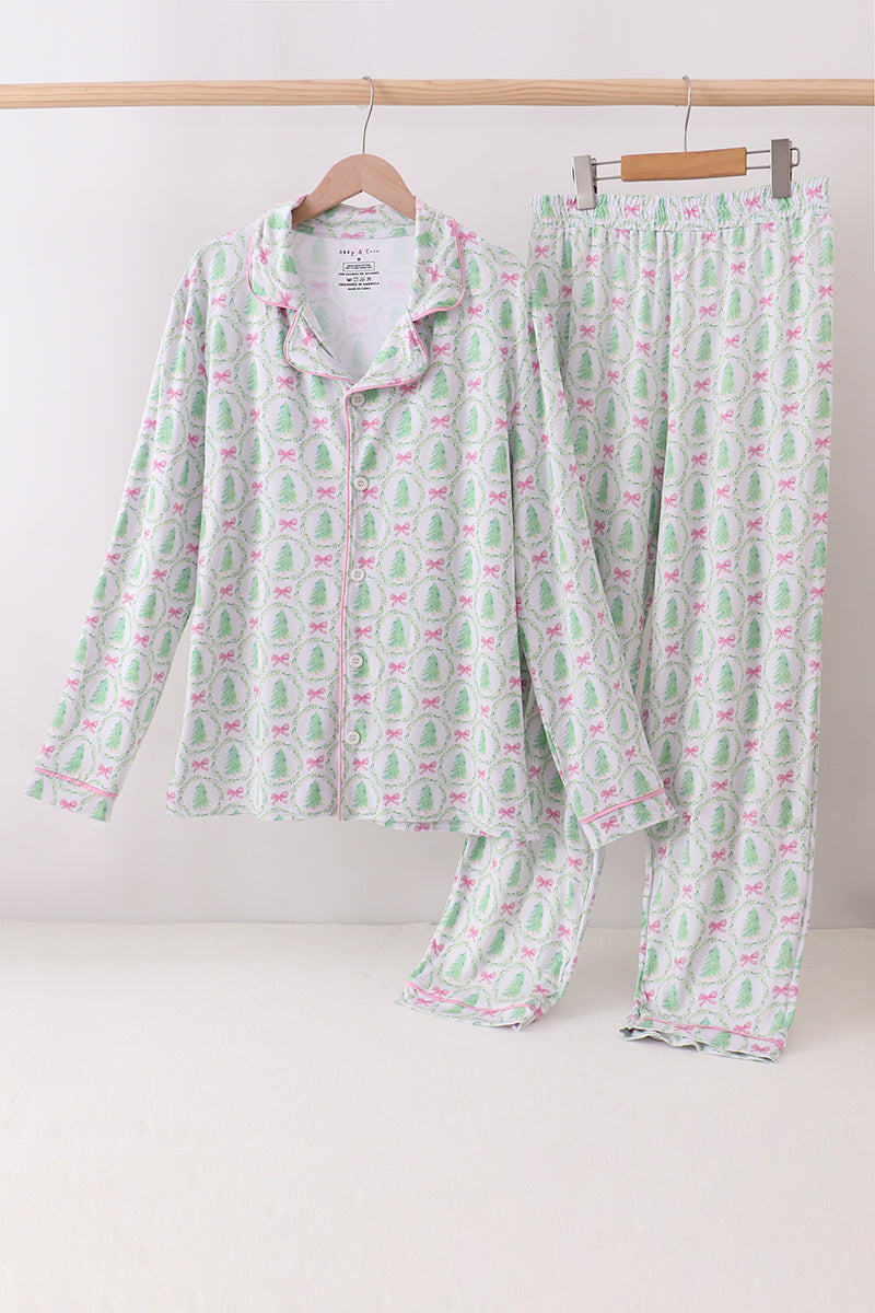 Floral pajama set on a wooden hanger against a white background