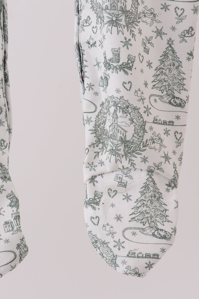 Christmas-themed stocking with winter scene pattern on a white background