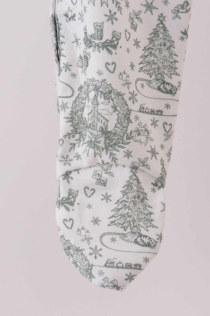 Christmas-themed fabric with trees, stars, and snowflakes on a white background