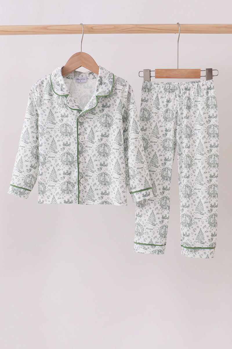 Floral pajama set hanging on a rack against a white background