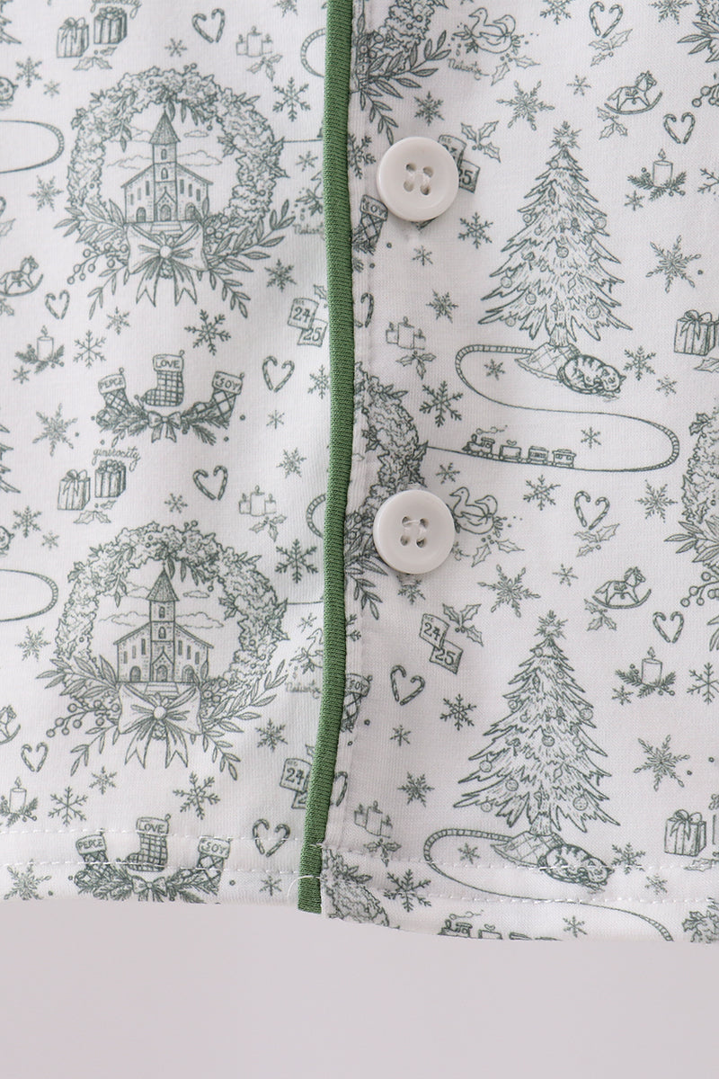 Fabric with Christmas-themed pattern featuring trees, stars, and buttons on a white background