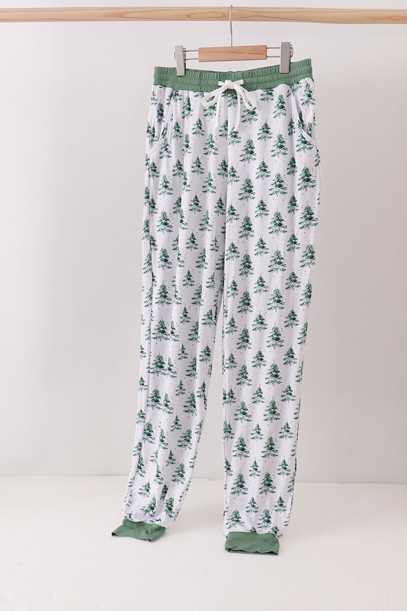 Floral-patterned pajama pants on a hanger against a white background