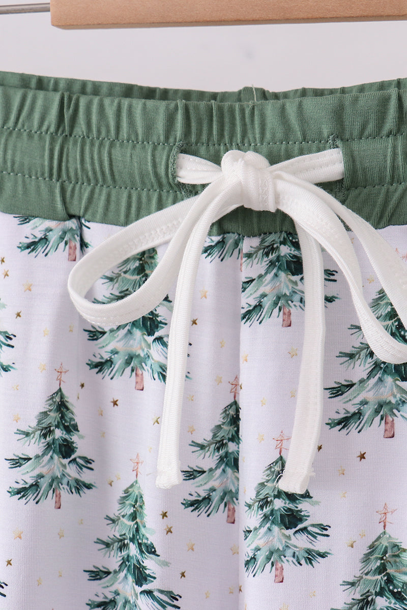 Green shorts with a white drawstring on a white background