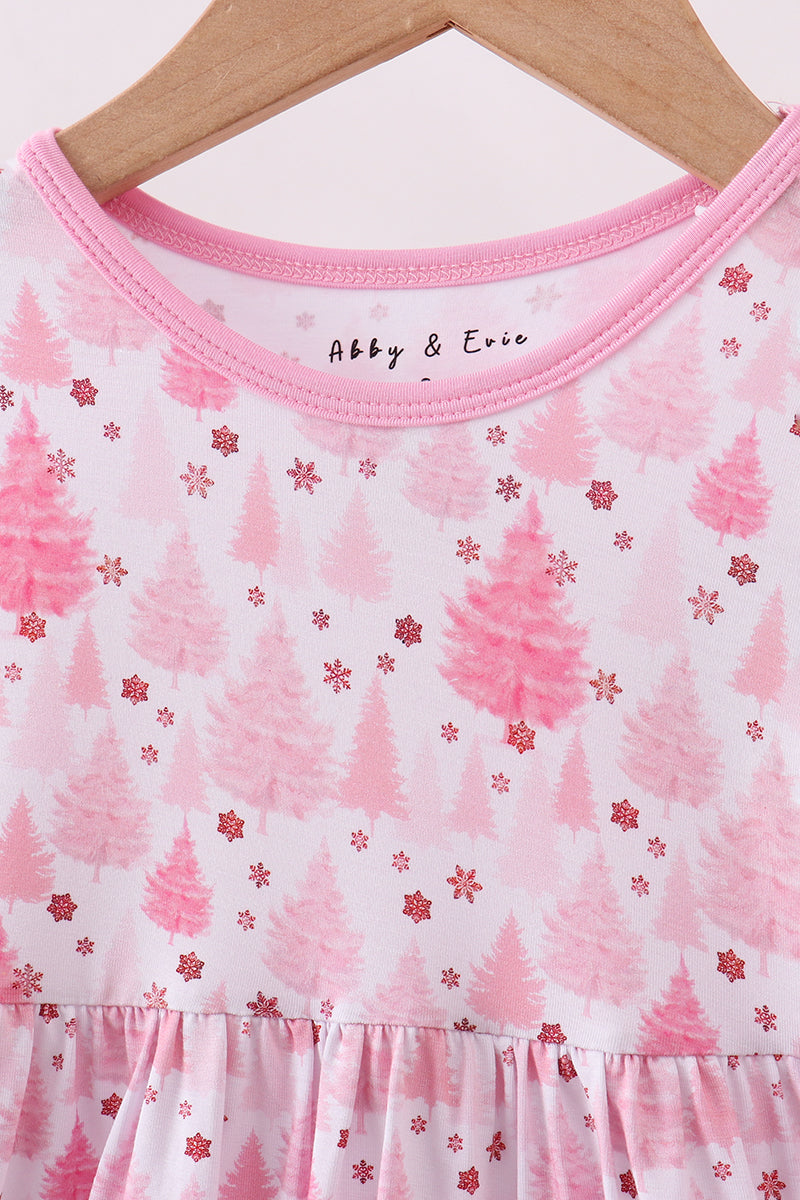 Pink and white dress with tree pattern on a hanger, brand 'Abby & Ernie' visible.