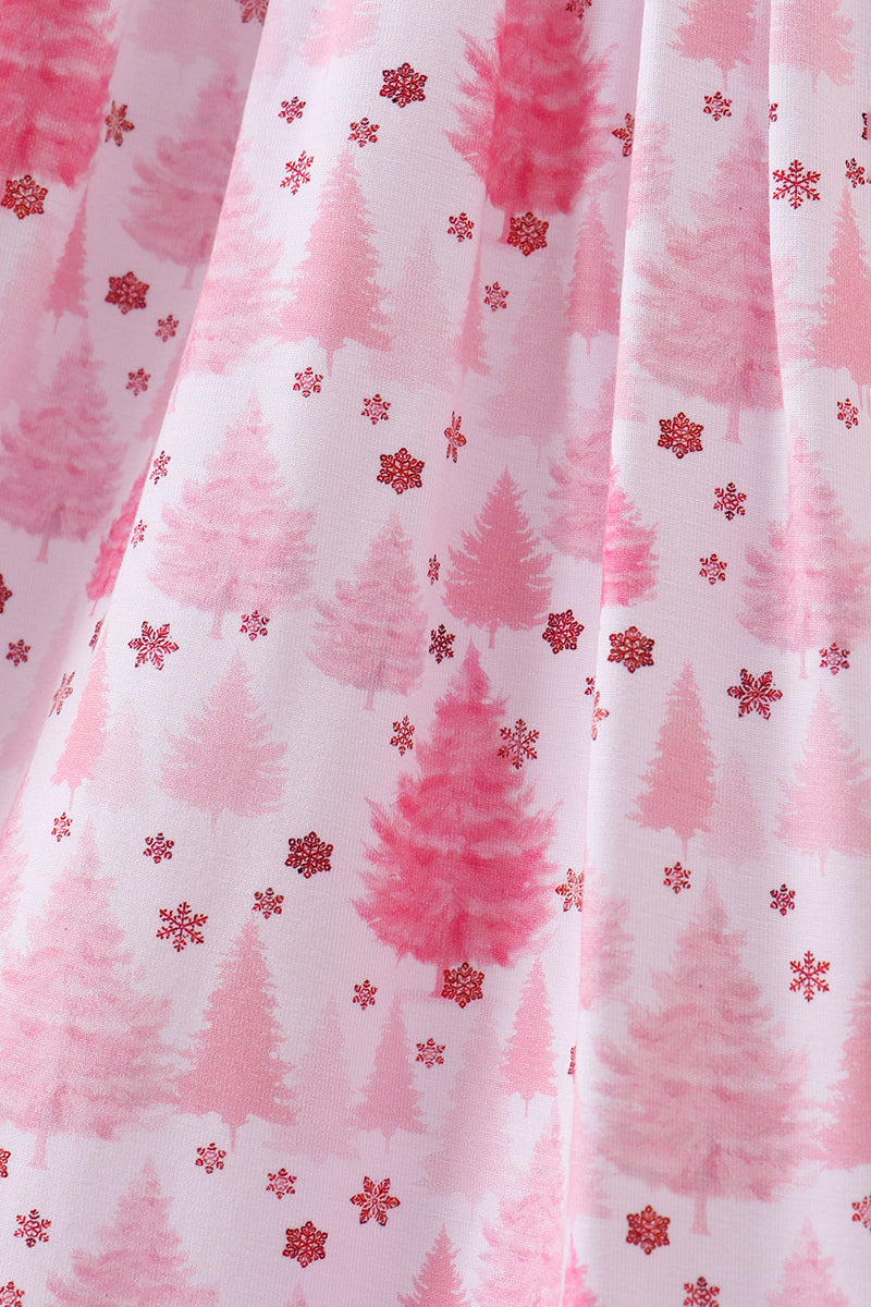 Pink and white fabric with tree and snowflake pattern