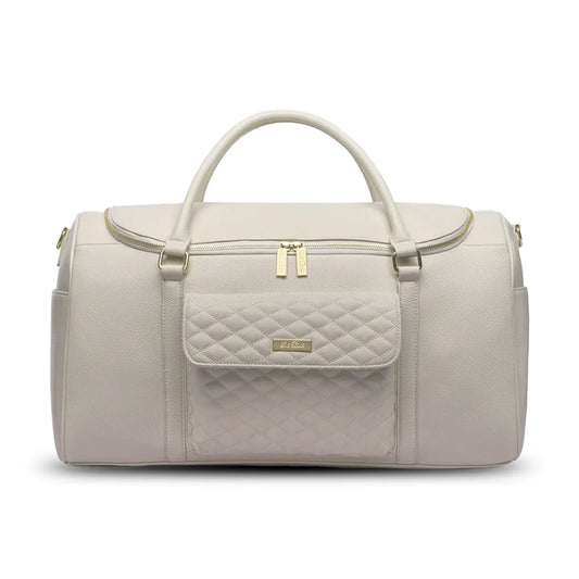 Light gray quilted duffel bag with gold accents on a white background