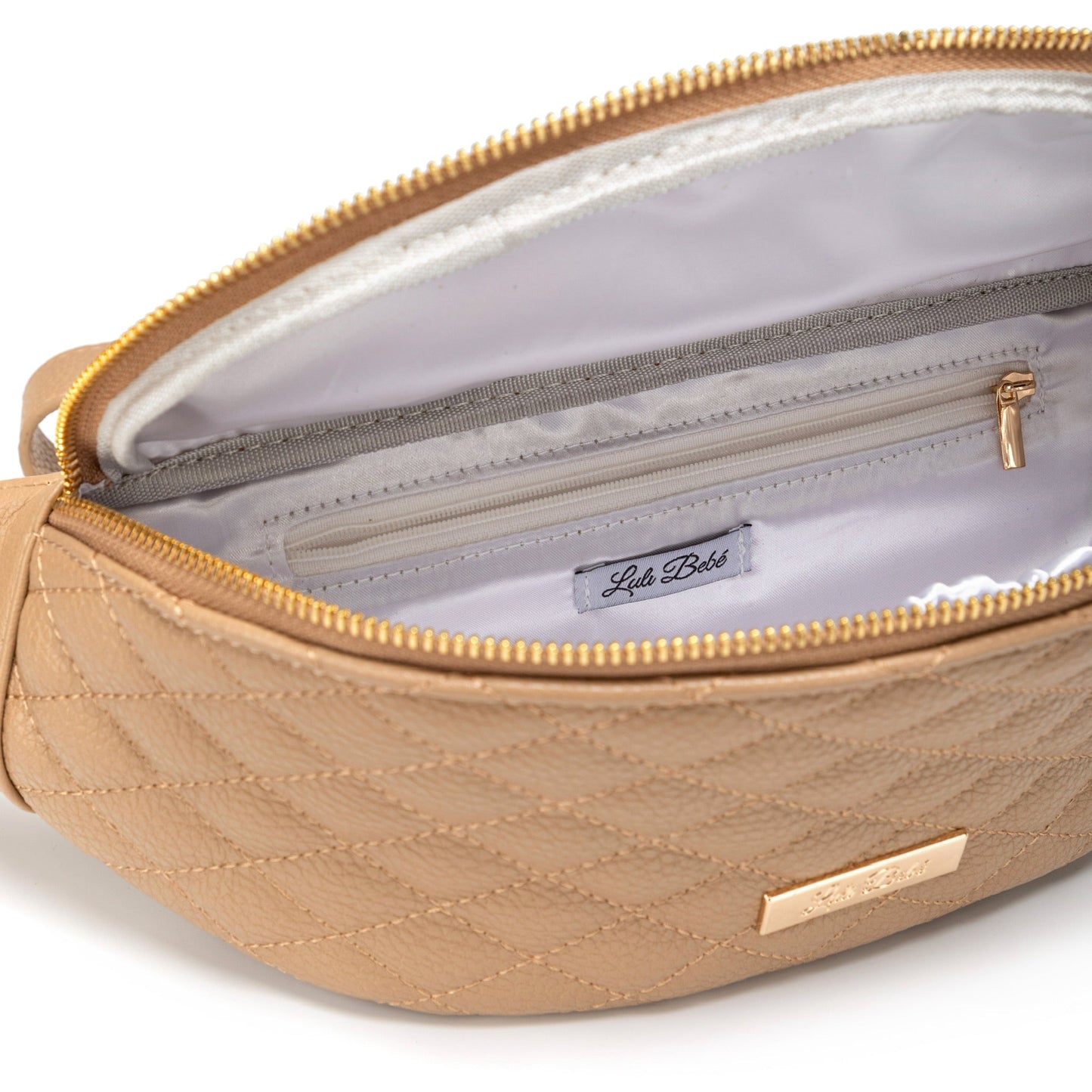 Beige quilted bag with gold zipper and visible brand label on a white background