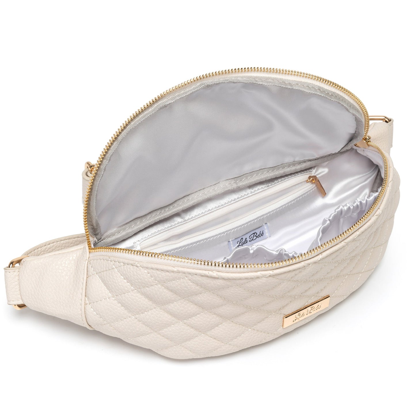 Beige quilted waist bag with gold zipper and brand label on a white background
