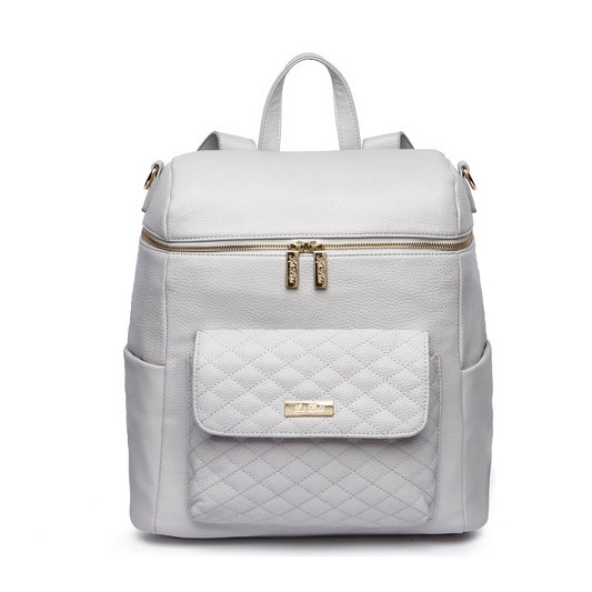 A stone grey Monaco Diaper Bag with premium vegan leather, featuring smooth-glide YKK zippers and a quilted front pocket. It has a structured design with backpack straps and a laptop compartment.