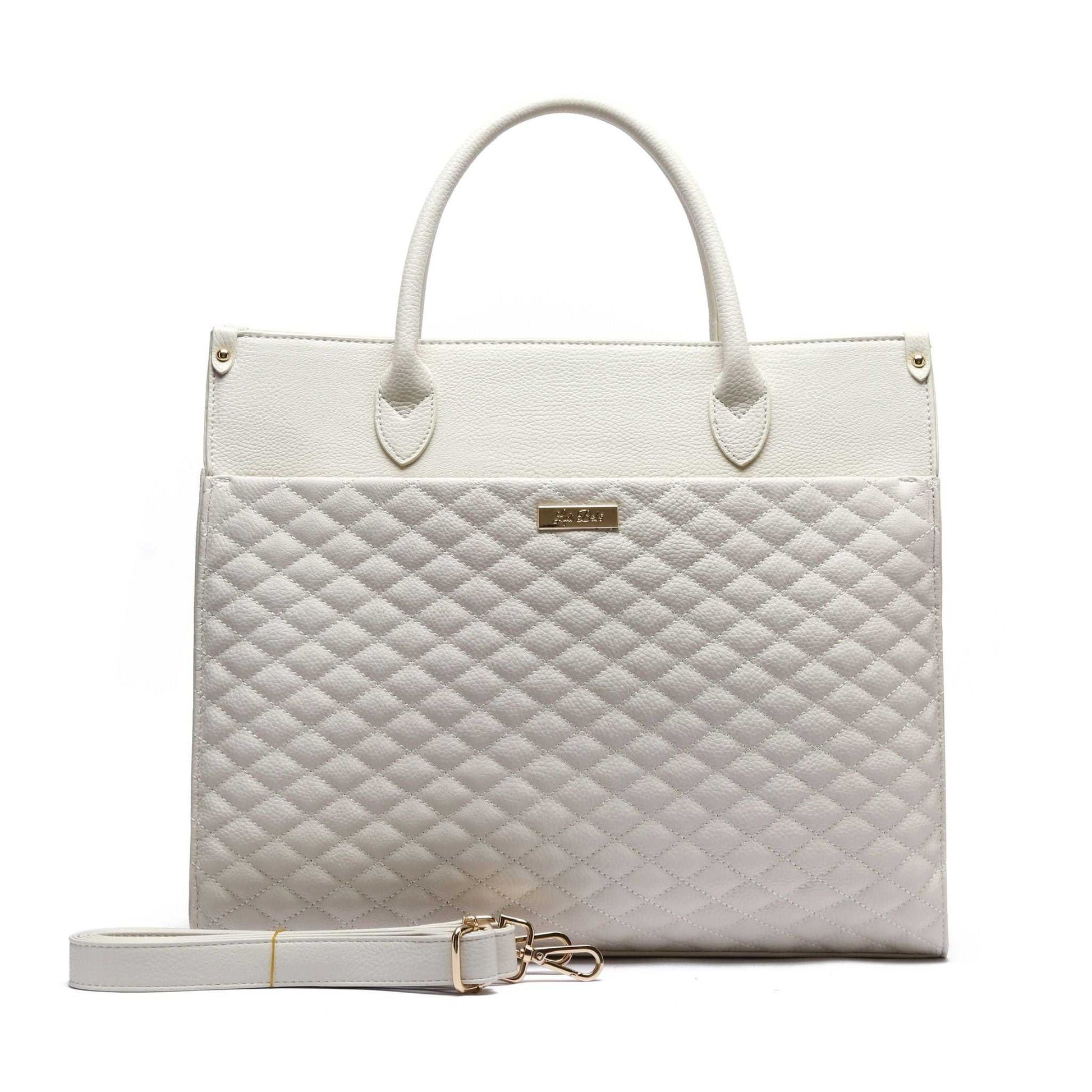 White quilted handbag with a gold strap on a white background