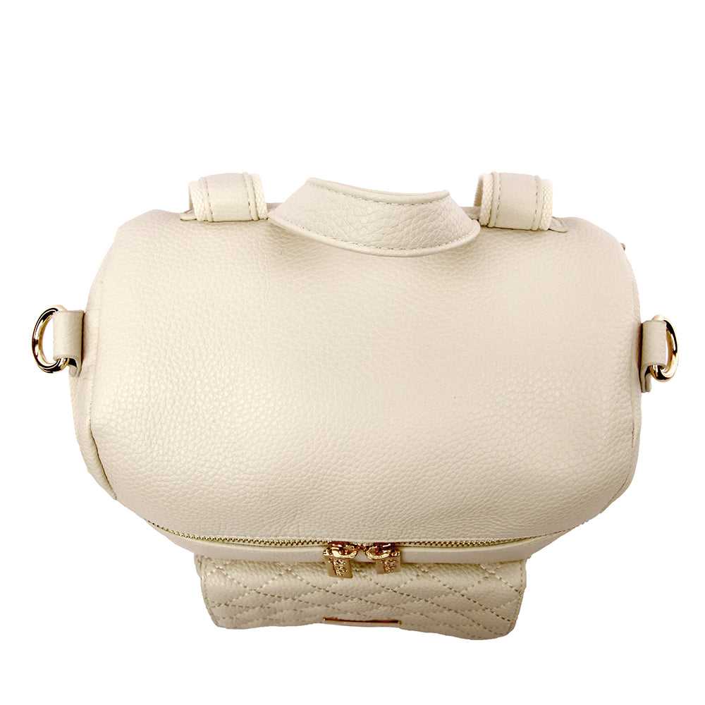 Beige handbag with gold accents on a white background