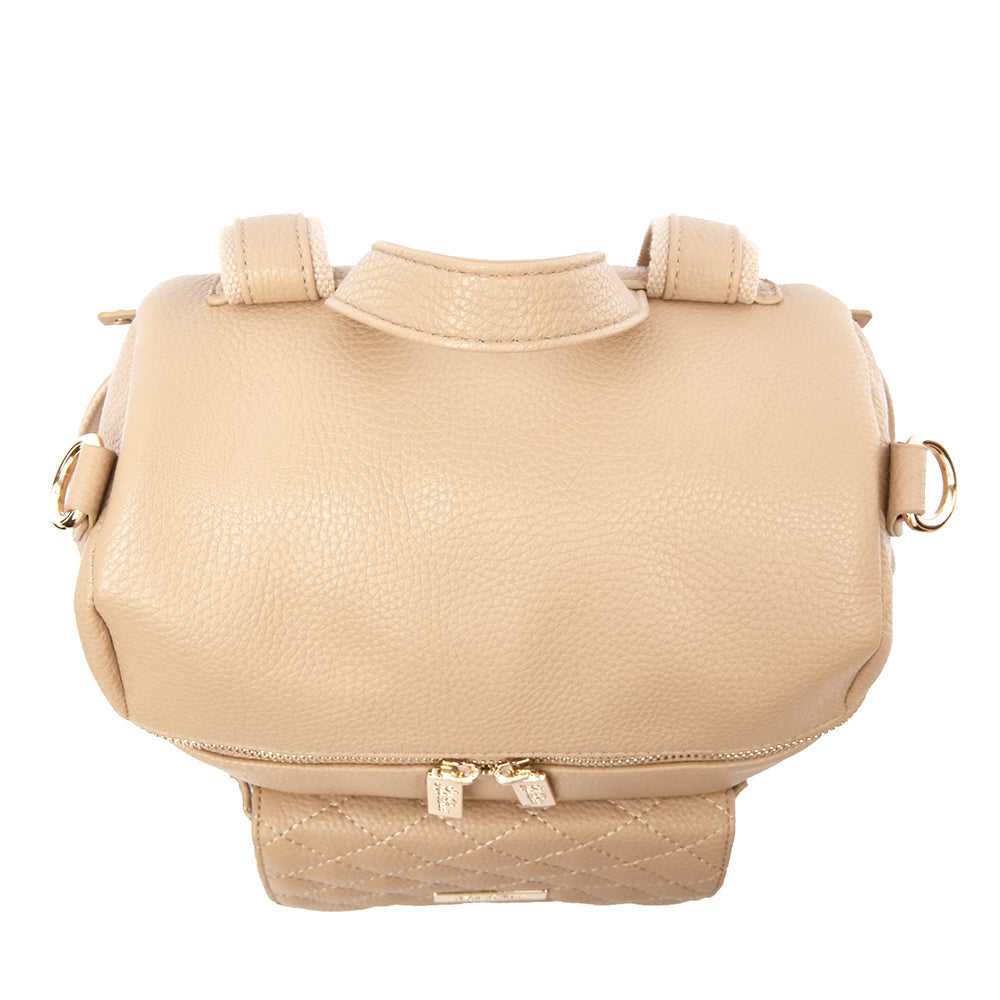 Beige handbag with decorative elements on a white background