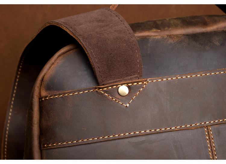 Close-up of a brown leather bag with stitching detail