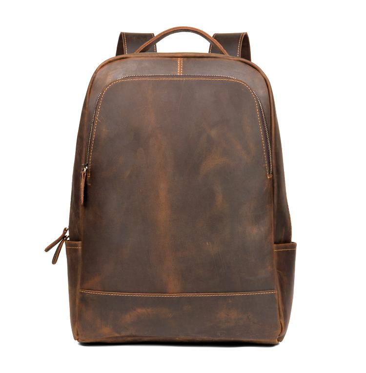 Brown leather backpack on a white background