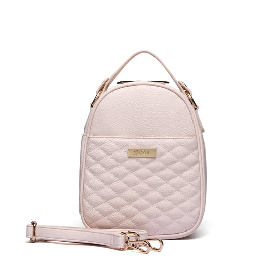 Quilted pink backpack with a visible brand label on a white background