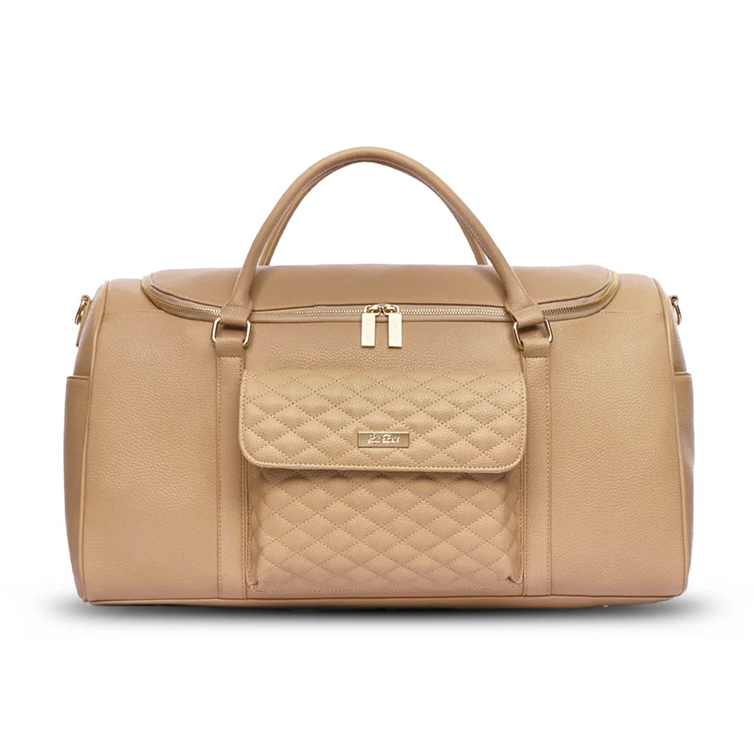 Beige duffel bag with quilted flap on a white background