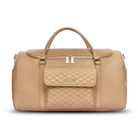 Beige duffel bag with quilted flap on a white background